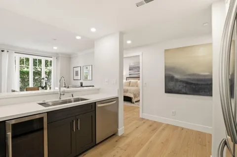 a kitchen with a sink and a window