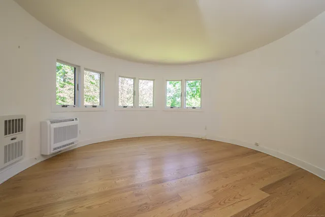 an empty room with windows