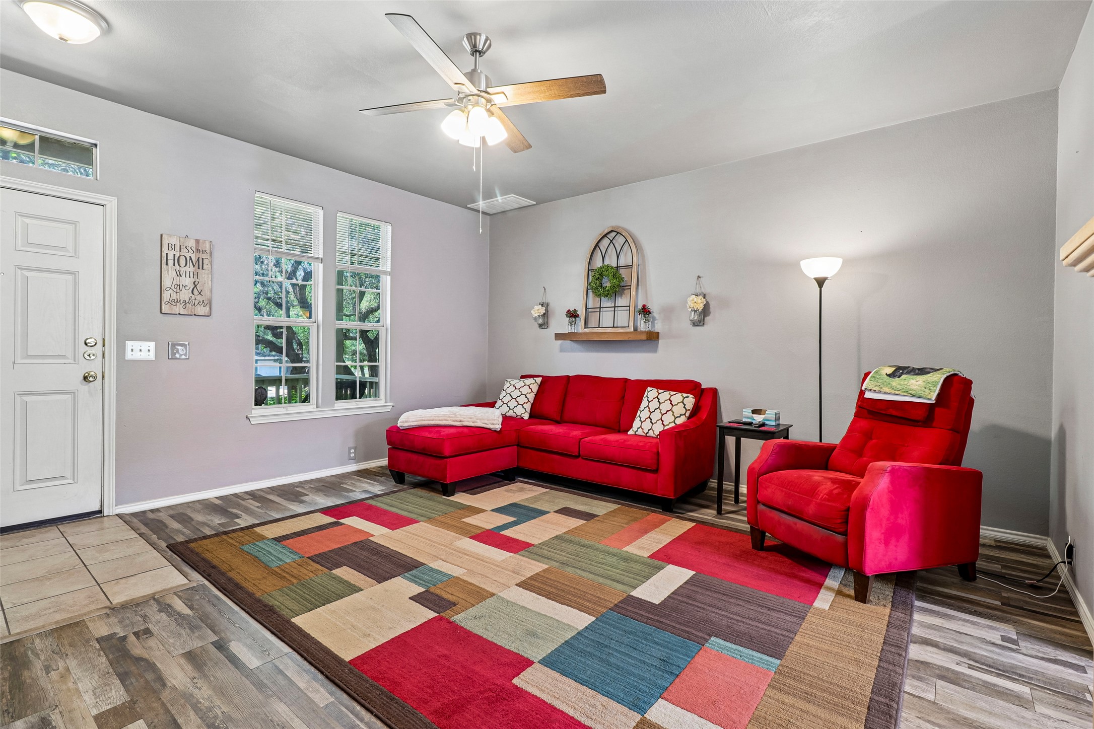 311 A Utterback Kyle, TX 78640 - Photo 8 of 40 a living room with furniture rug and window