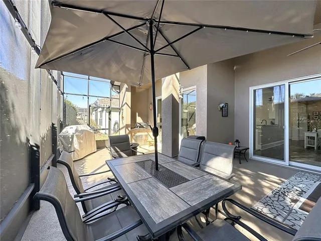 a bedroom with bed and a chandelier