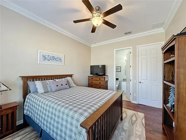 a workspace with furniture and chandelier