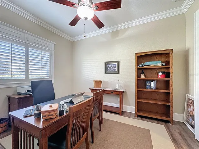 an aerial view of a house with outdoor space and lake view