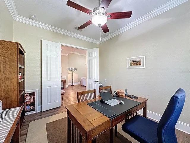 an aerial view of a houses with a lake view