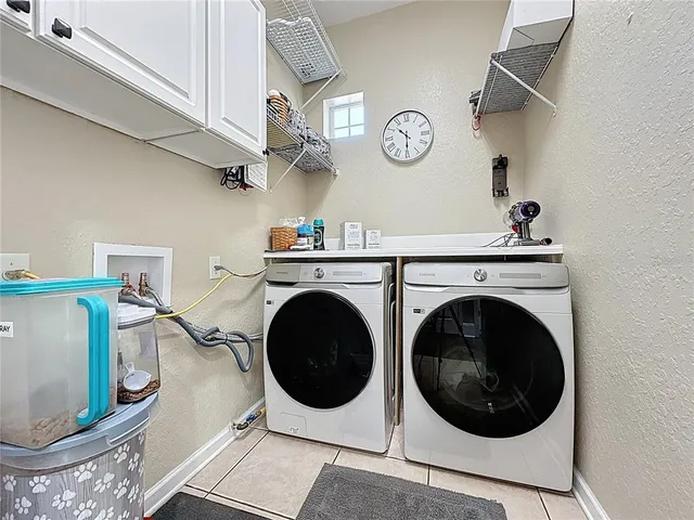 an aerial view of a city with lots of residential buildings