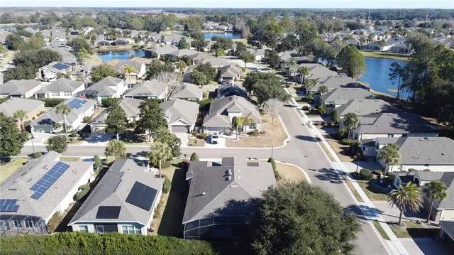 an aerial view of a city with lots of residential buildings