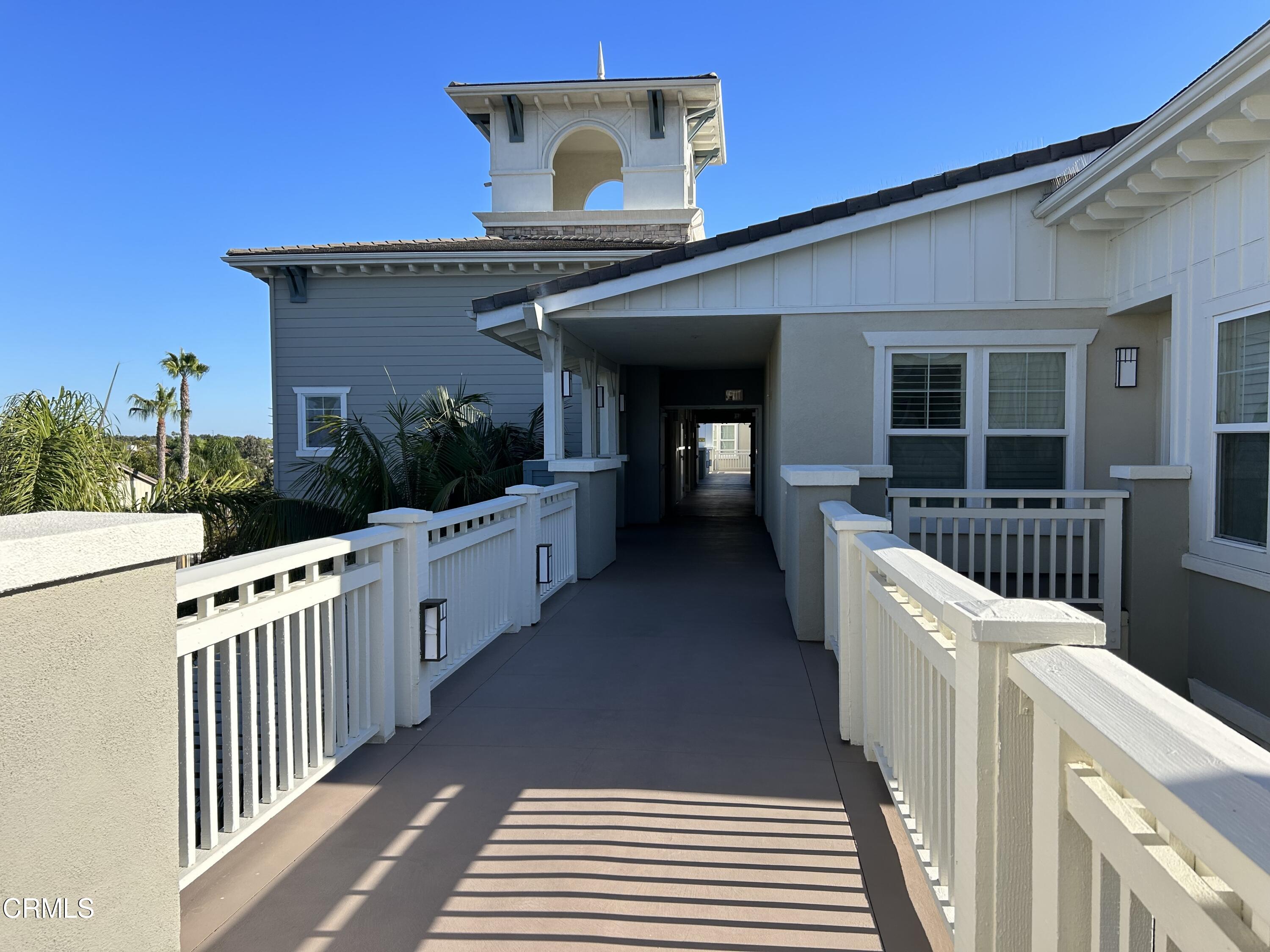1561 Windshore Way Oxnard, CA 93035 - Photo 2 of 17 a view of a house with wooden deck