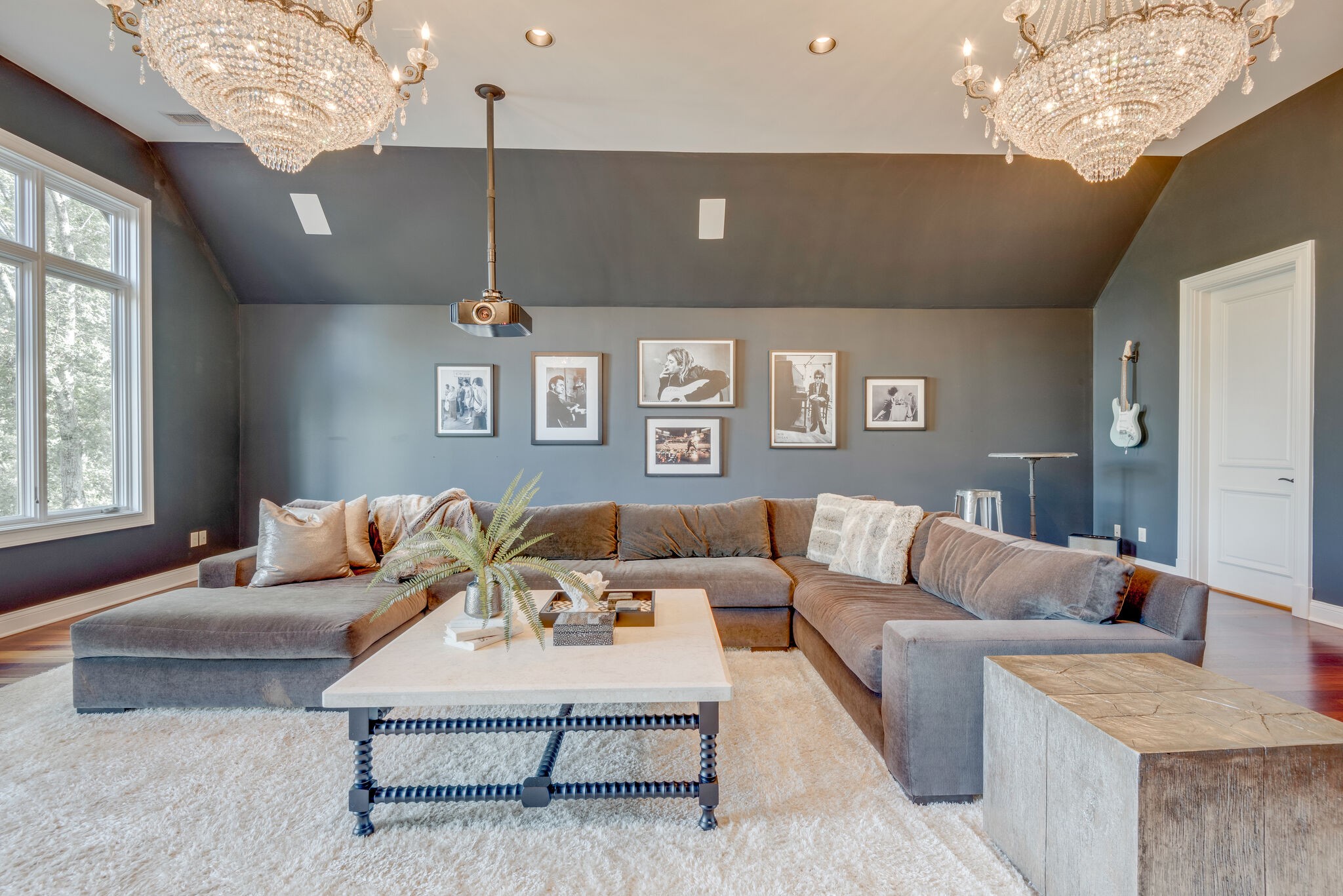 4315 Sneed Road Nashville, TN 37215 - Photo 28 of 50 a living room with furniture and a chandelier