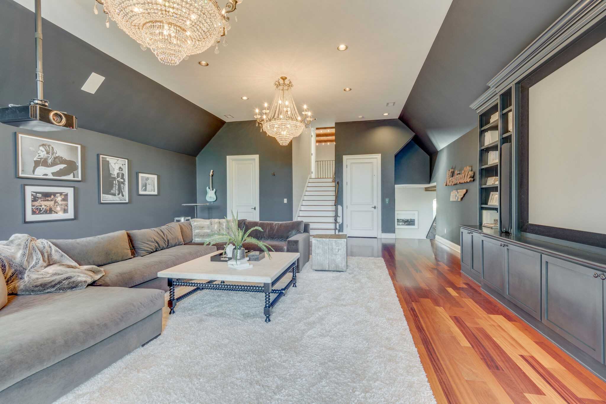 4315 Sneed Road Nashville, TN 37215 - Photo 29 of 50 a living room with furniture and a chandelier