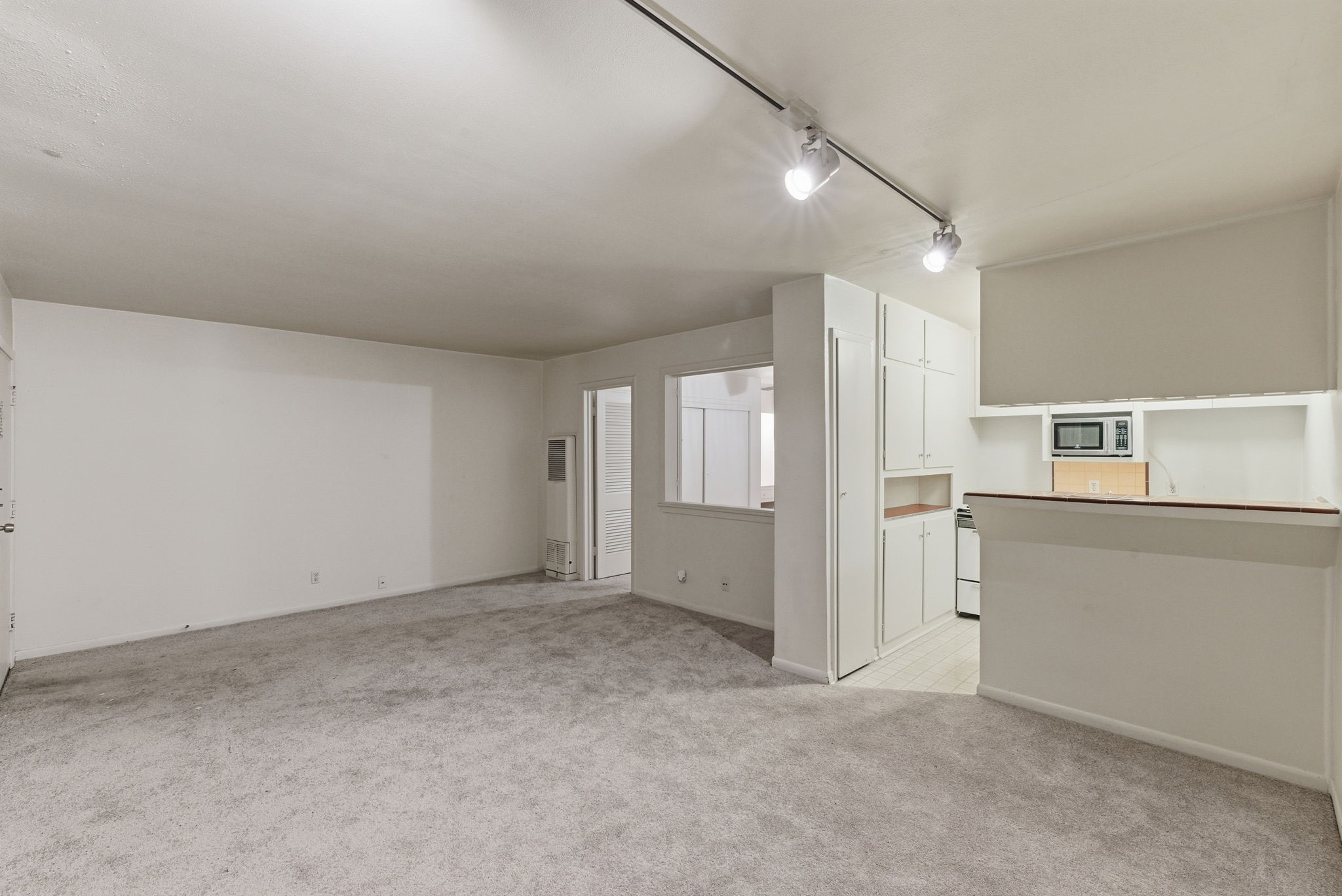 1941 Lexington Street, Unit 6 Houston, TX 77098 - Photo 34 of 50 Unit 5 Carpeted Living/Dining Room Combo