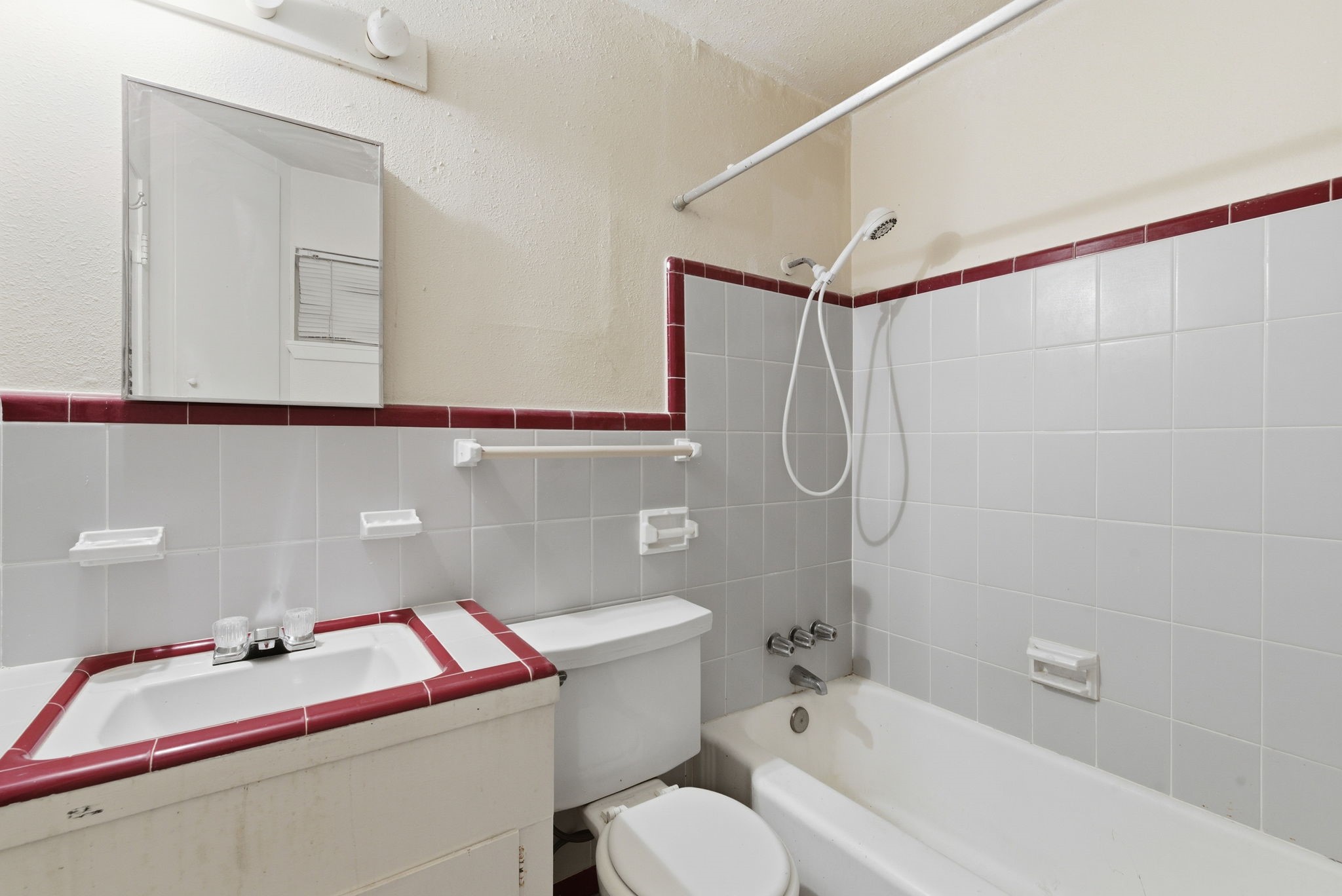 1941 Lexington Street, Unit 6 Houston, TX 77098 - Photo 38 of 50 a bathroom with a sink toilet and shower