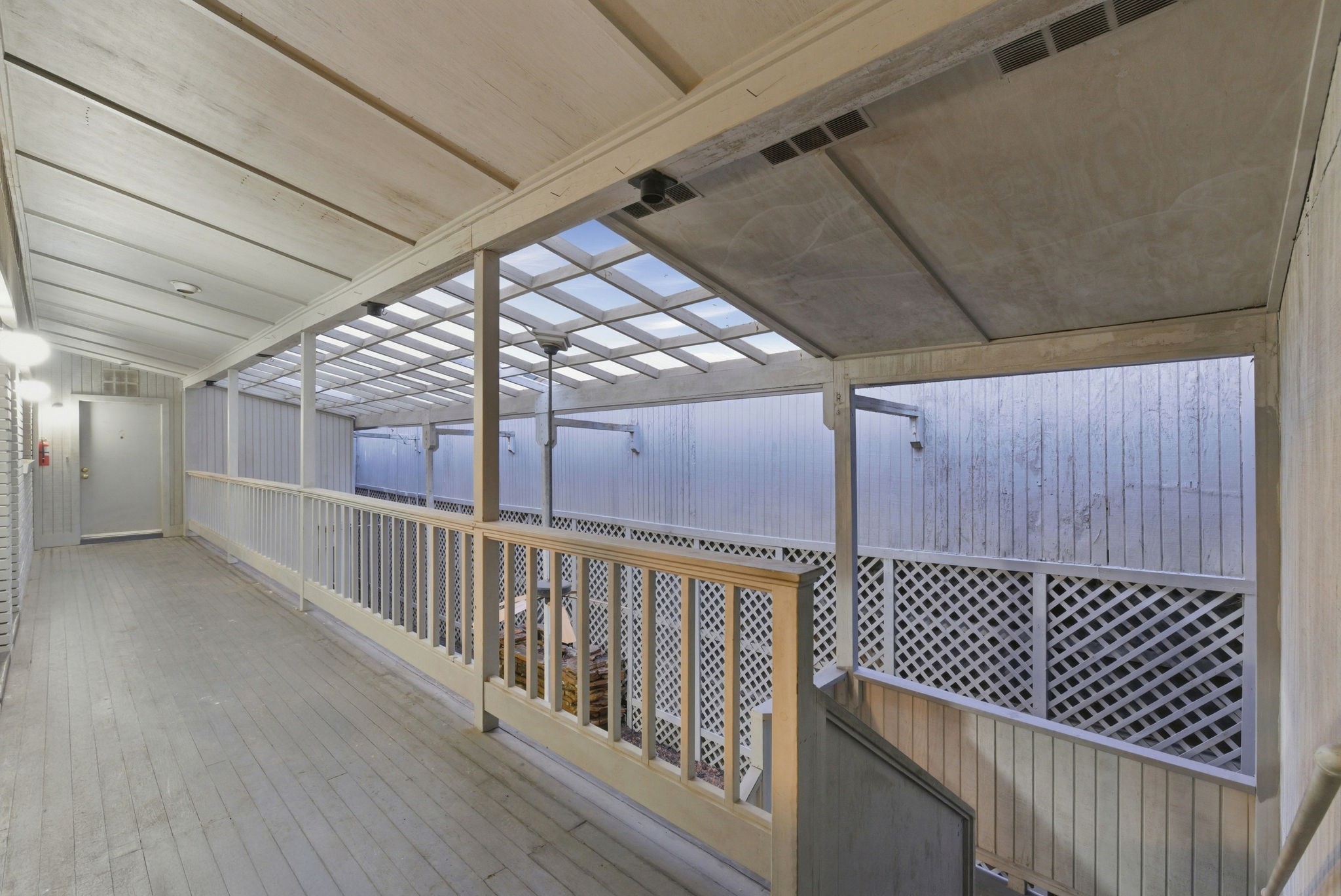 1941 Lexington Street, Unit 6 Houston, TX 77098 - Photo 7 of 50 View from Second Floor Overlooking the spacious patio downstairs.