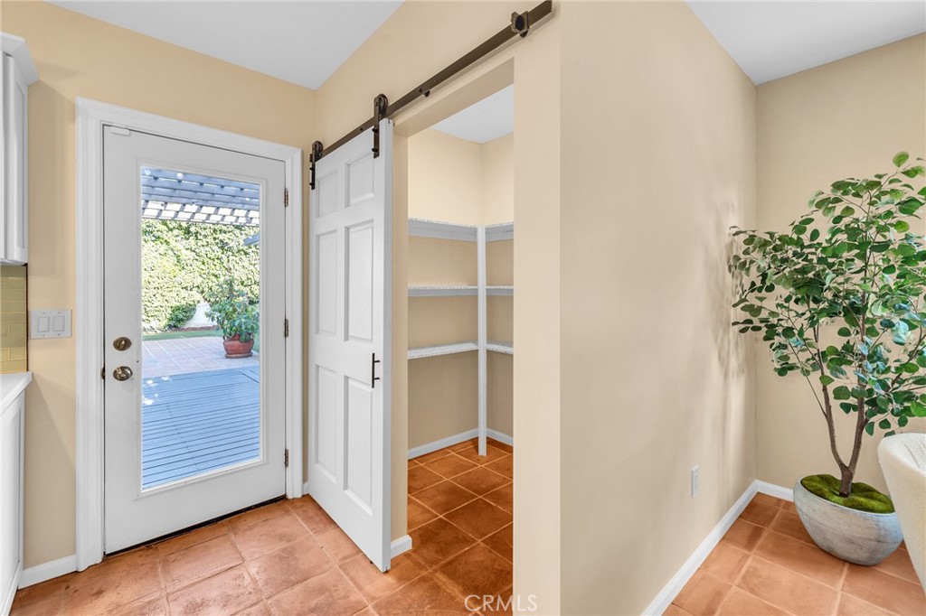 6620 Vesper Avenue Van Nuys, CA 91405 - Photo 13 of 40 a view of entryway with wooden floor and door