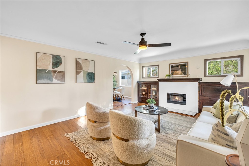 6620 Vesper Avenue Van Nuys, CA 91405 - Photo 3 of 40 a living room with furniture and a fireplace
