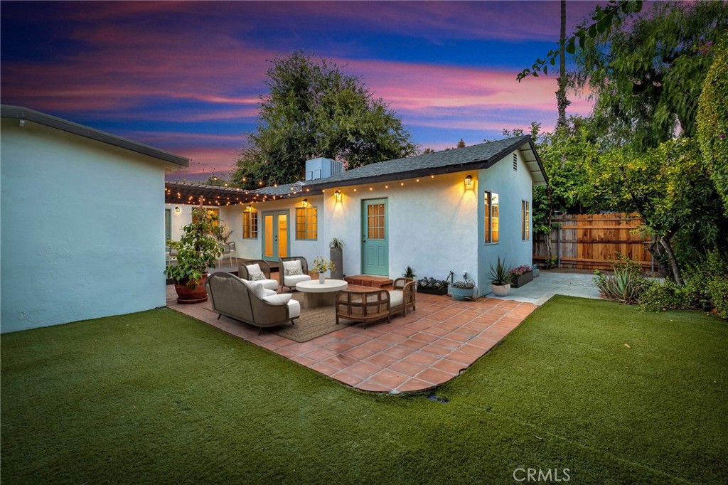 6620 Vesper Avenue Van Nuys, CA 91405 - Photo 31 of 40 a view of a house with backyard and sitting area
