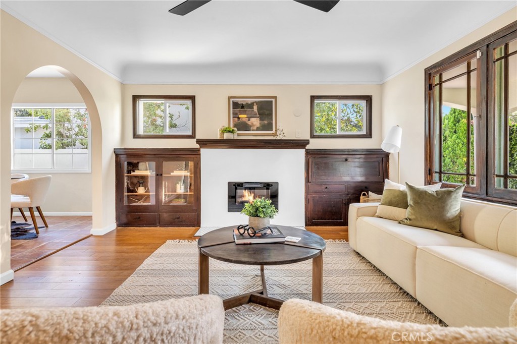 6620 Vesper Avenue Van Nuys, CA 91405 - Photo 4 of 40 a living room with furniture and a fireplace