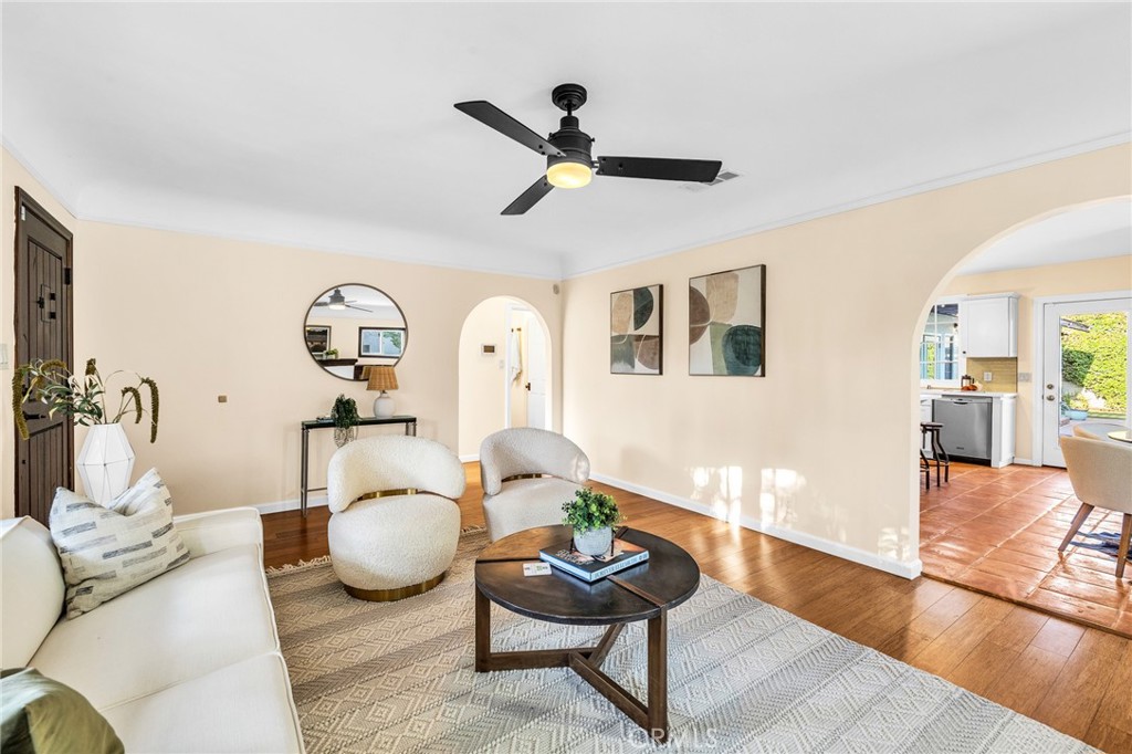 6620 Vesper Avenue Van Nuys, CA 91405 - Photo 5 of 40 a living room with furniture and a wooden floor