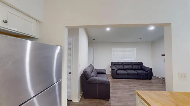 a kitchen with a refrigerator a sink and dishwasher
