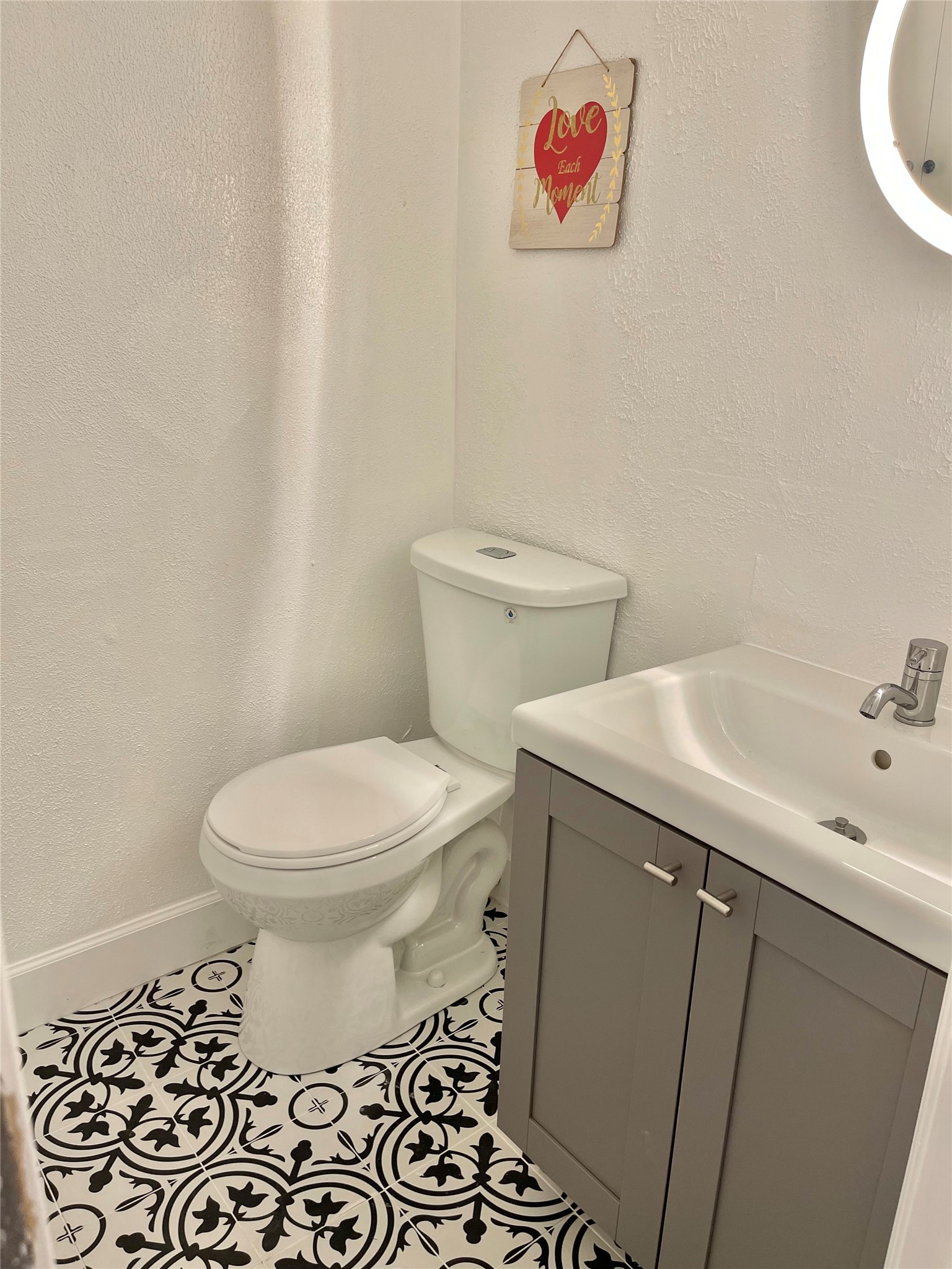 3400 Timmons Lane, Unit 13 Houston, TX 77027 - Photo 16 of 35 a white toilet sitting next to a bathroom sink