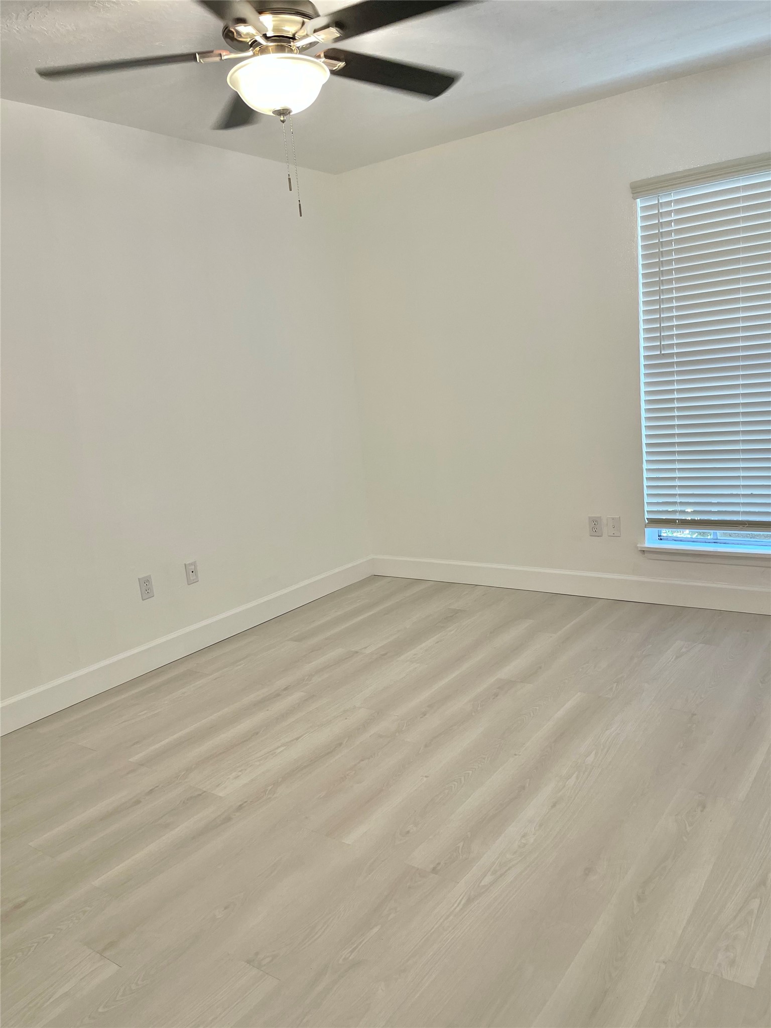3400 Timmons Lane, Unit 13 Houston, TX 77027 - Photo 30 of 35 an empty room with a window