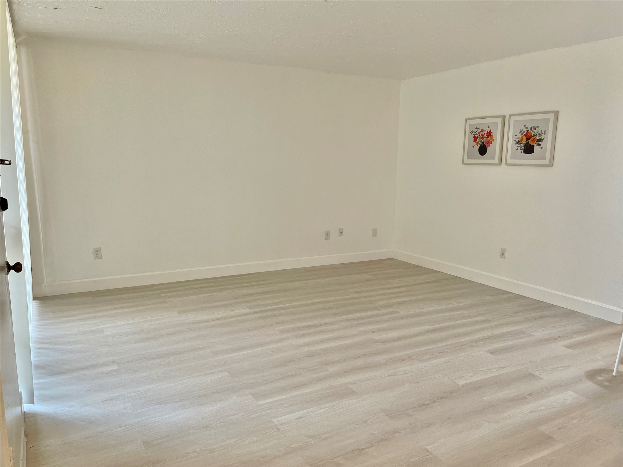 3400 Timmons Lane, Unit 13 Houston, TX 77027 - Photo 32 of 35 a view of a room with wooden floor
