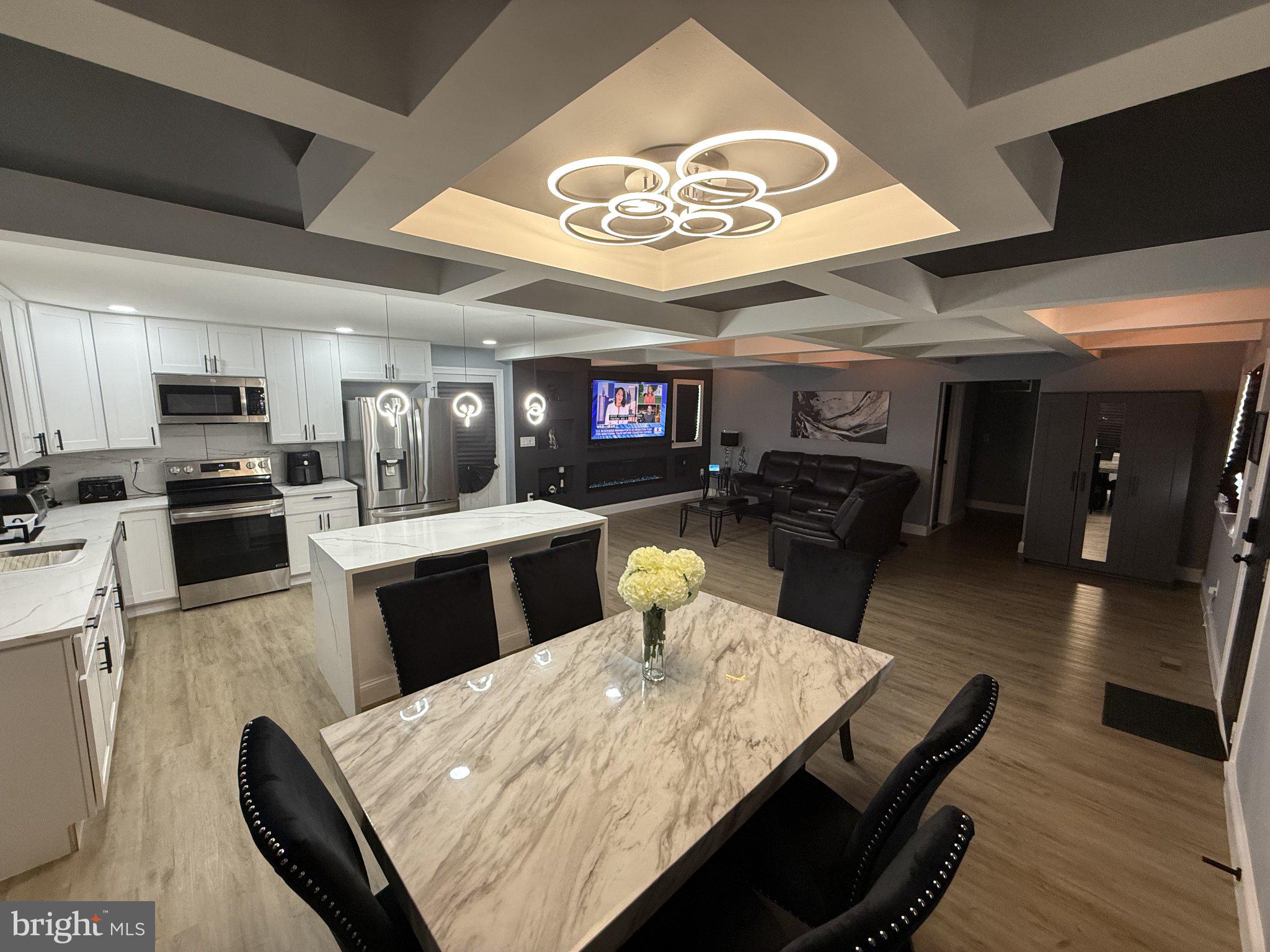 7022 Highbridge Road Bowie, MD 20720 - Photo 2 of 9 Modern kitchen with stylish lighting.