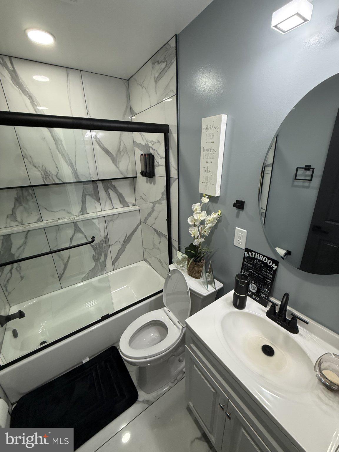 7022 Highbridge Road Bowie, MD 20720 - Photo 5 of 9 Modern bathroom with elegant finishes.
