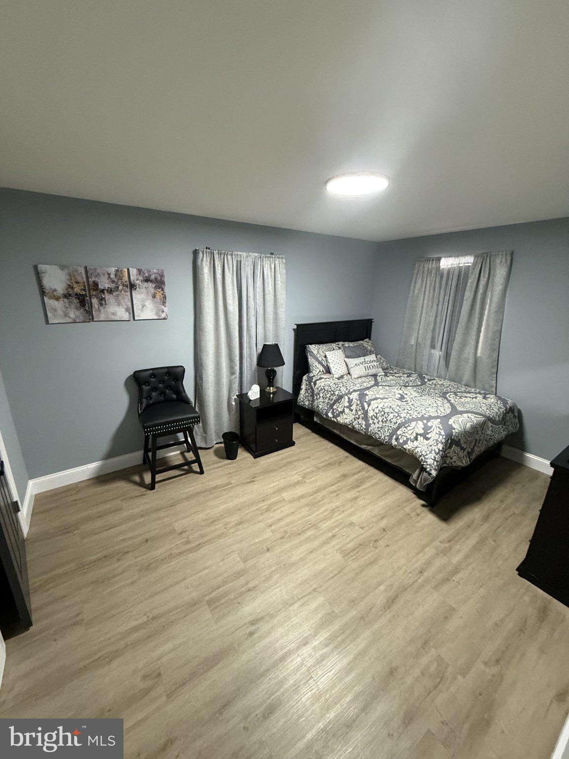 7022 Highbridge Road Bowie, MD 20720 - Photo 8 of 9 Serene bedroom with calming hues.