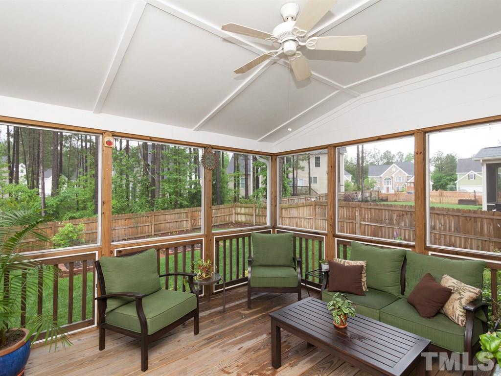 5968 Jones Farm Road Wake Forest, NC 27587 - Photo 23 of 25 Exterior living space over looking well manicured fenced in back yard