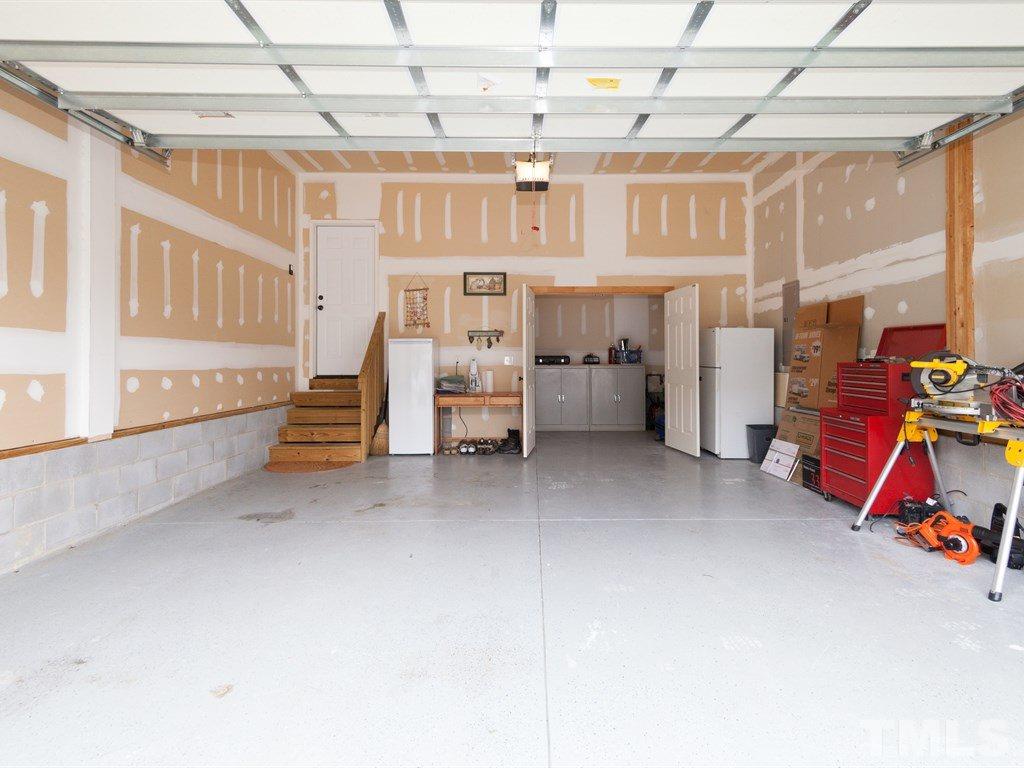 5968 Jones Farm Road Wake Forest, NC 27587 - Photo 25 of 25 Garage with bump out work shop. Plenty of space and finished floor.