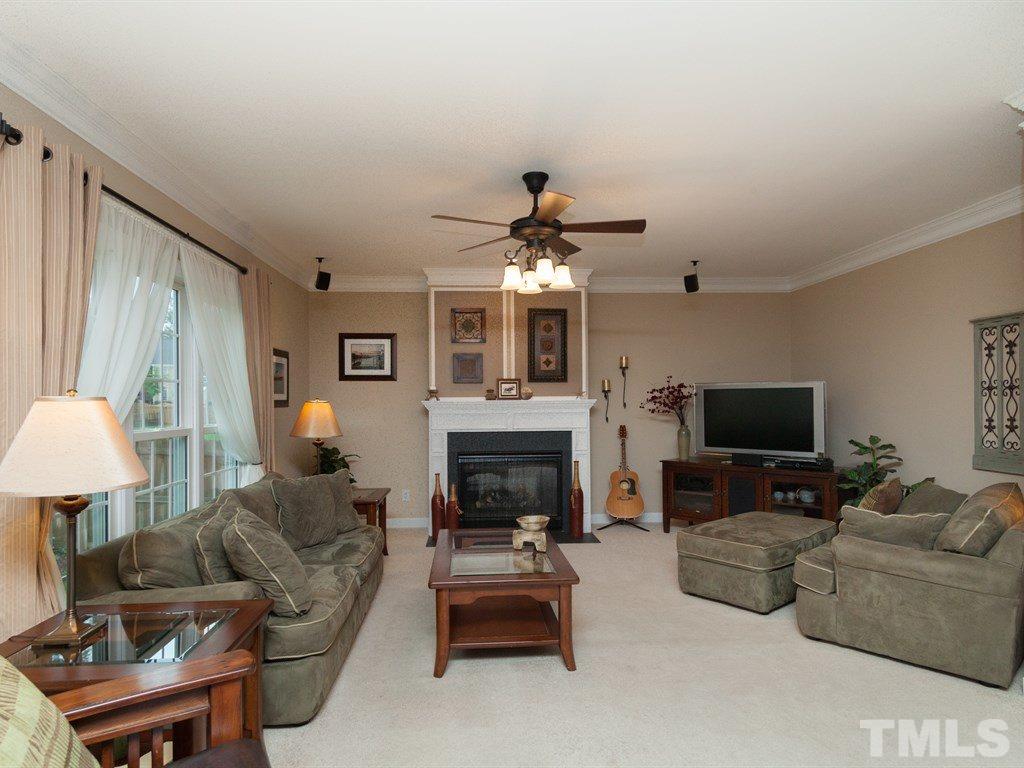 5968 Jones Farm Road Wake Forest, NC 27587 - Photo 4 of 25 Fireplace and surround sound speakers, open view to kitchen