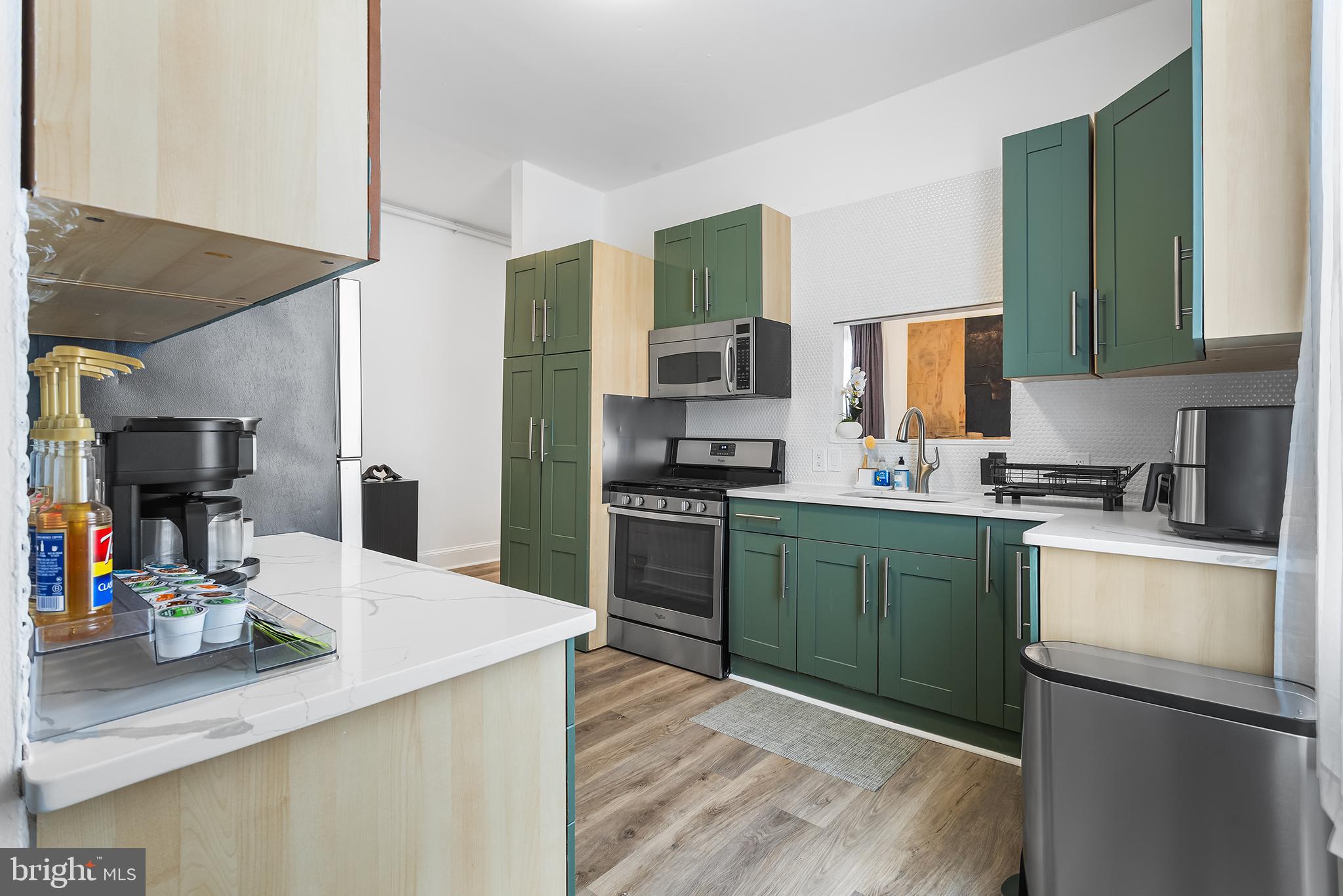 569 North 20th Street, Unit 2F Philadelphia, PA 19130 - Photo 12 of 21 a kitchen with a sink appliances and cabinets