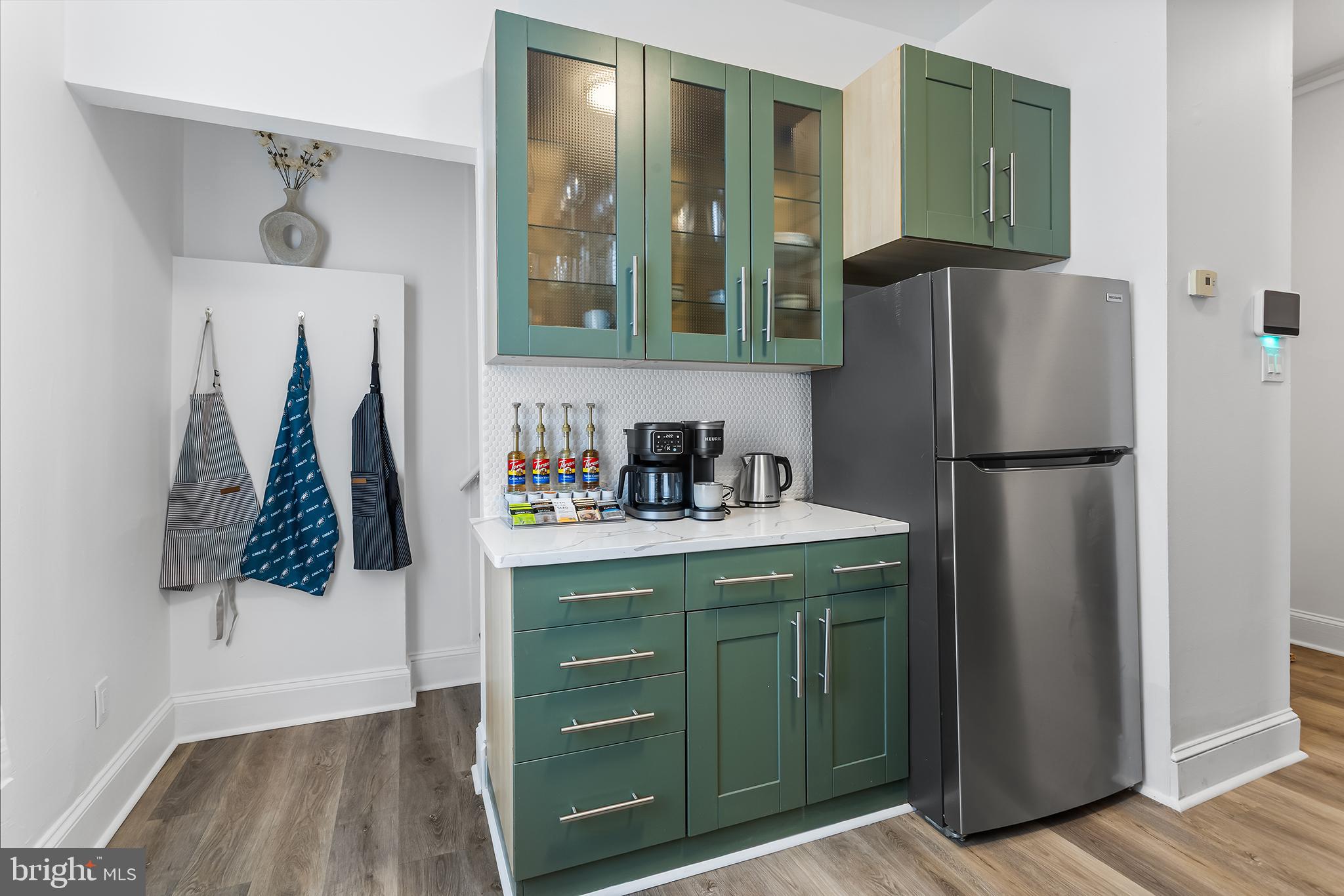 569 North 20th Street, Unit 2F Philadelphia, PA 19130 - Photo 13 of 21 a kitchen with a refrigerator and a sink