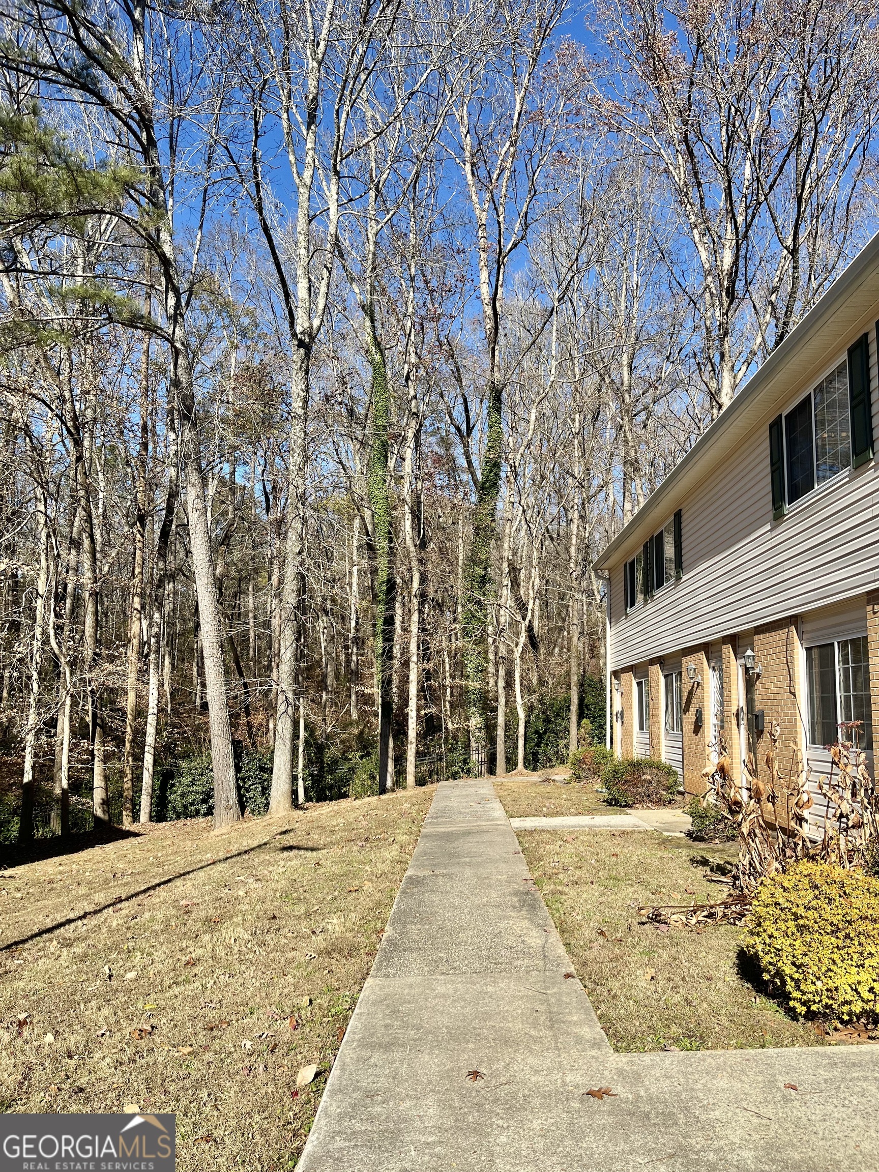 405 Fairburn Road Southwest, Unit 17 Atlanta, GA 30331 - Photo 20 of 20 a view of a house with snow on the road