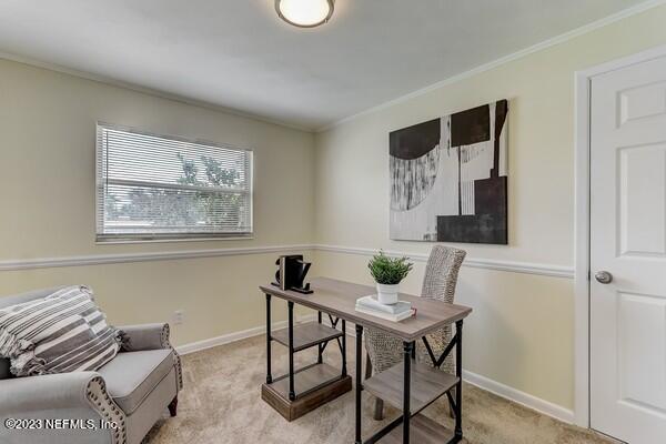 490 Sigsbee Road Orange Park, FL 32073 - Photo 8 of 33 a view of a livingroom with furniture and a window