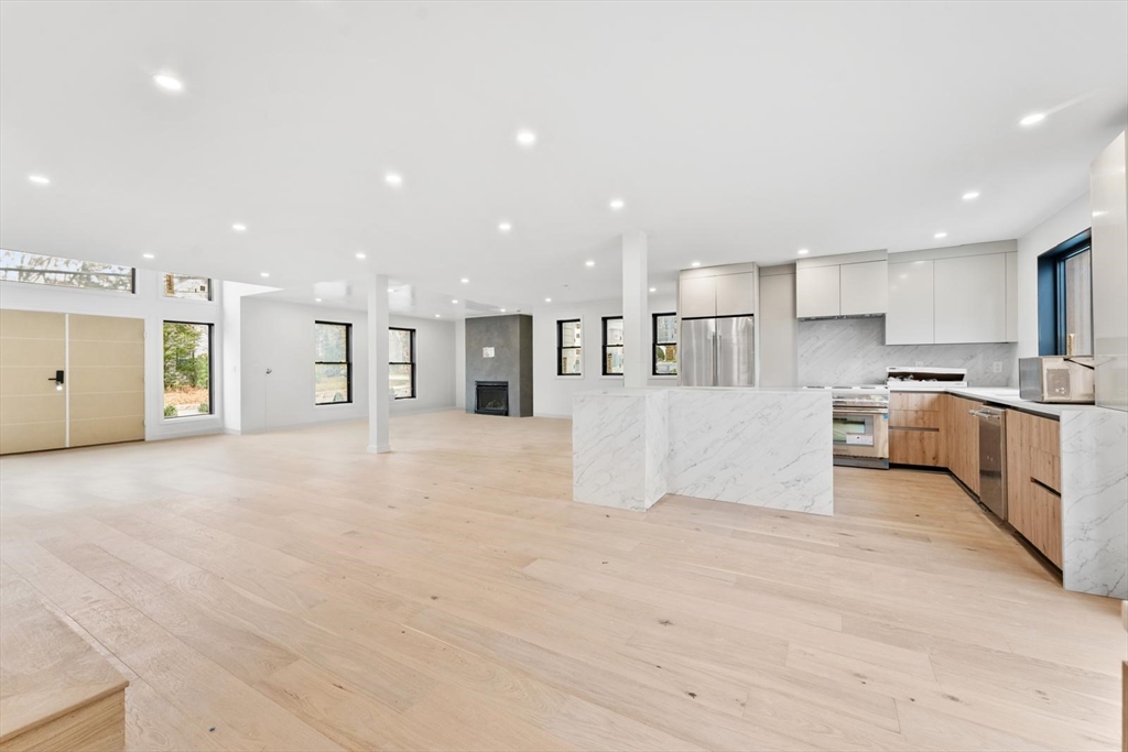 212 Central Avenue Needham, MA 02494 - Photo 22 of 29 a view of kitchen with wooden cabinet and stainless steel appliances