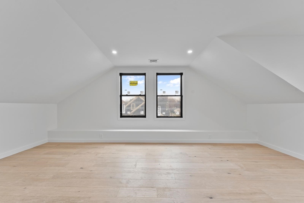 212 Central Avenue Needham, MA 02494 - Photo 25 of 29 a view of an empty room with a window