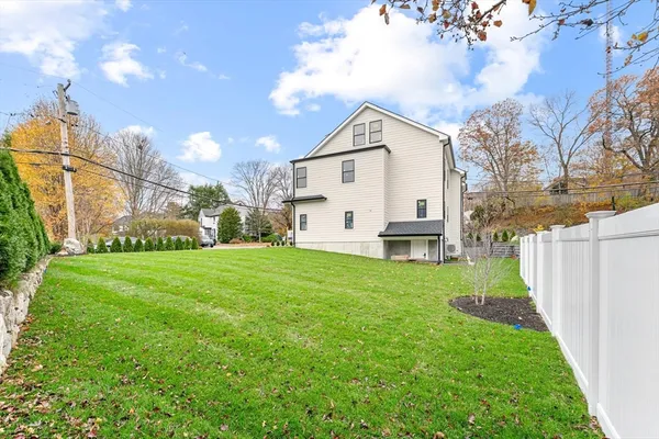a view of a back yard of the house