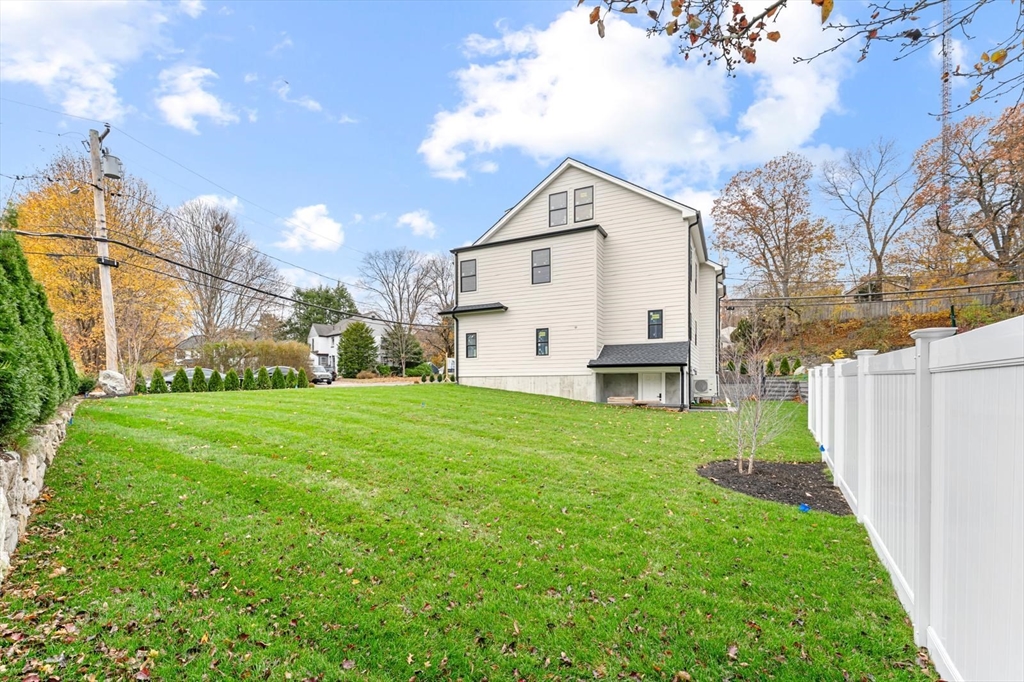 212 Central Avenue Needham, MA 02494 - Photo 4 of 29 a view of a back yard of the house