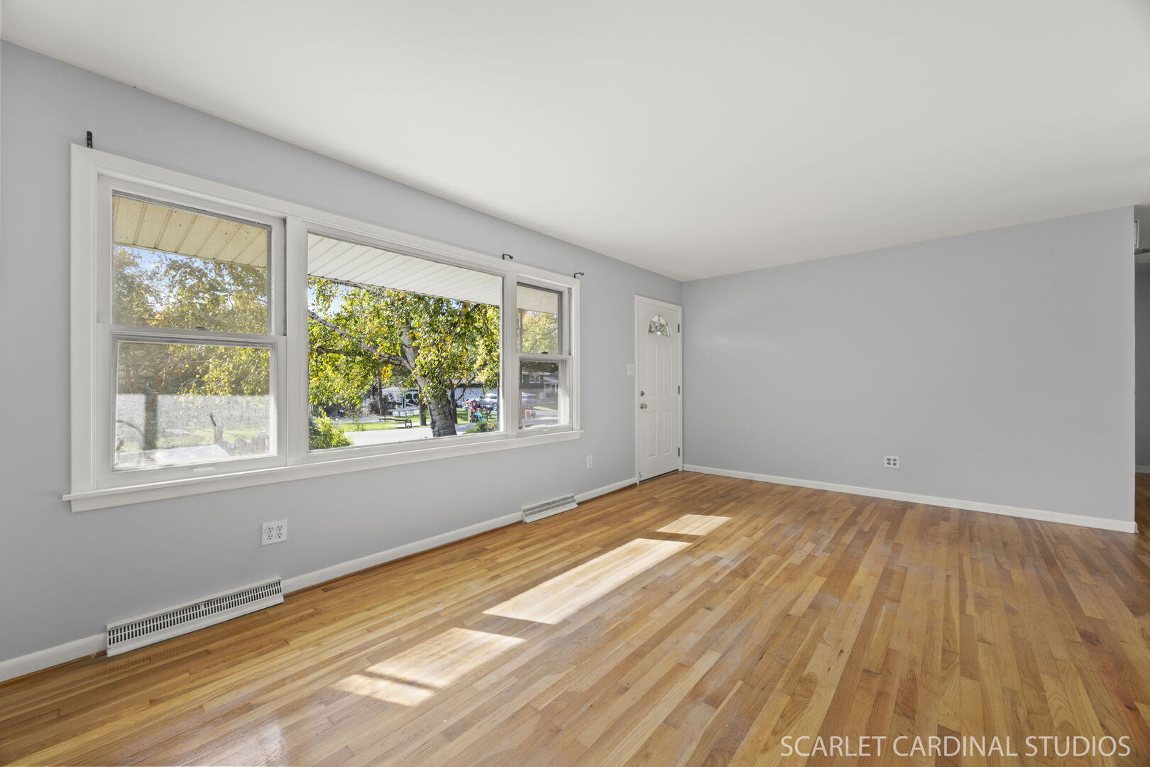 27W300 Beecher Avenue Winfield, IL 60190 - Photo 5 of 16 a view of empty room with wooden floor and fan