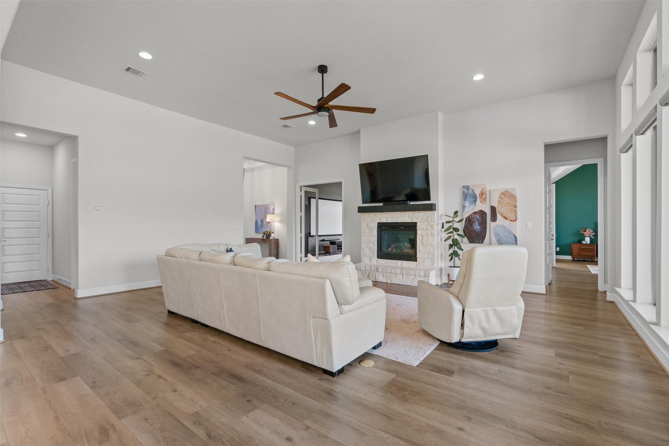 101 Pienza Drive Georgetown, TX 78628 - Photo 14 of 40 a living room with fireplace furniture and a flat screen tv
