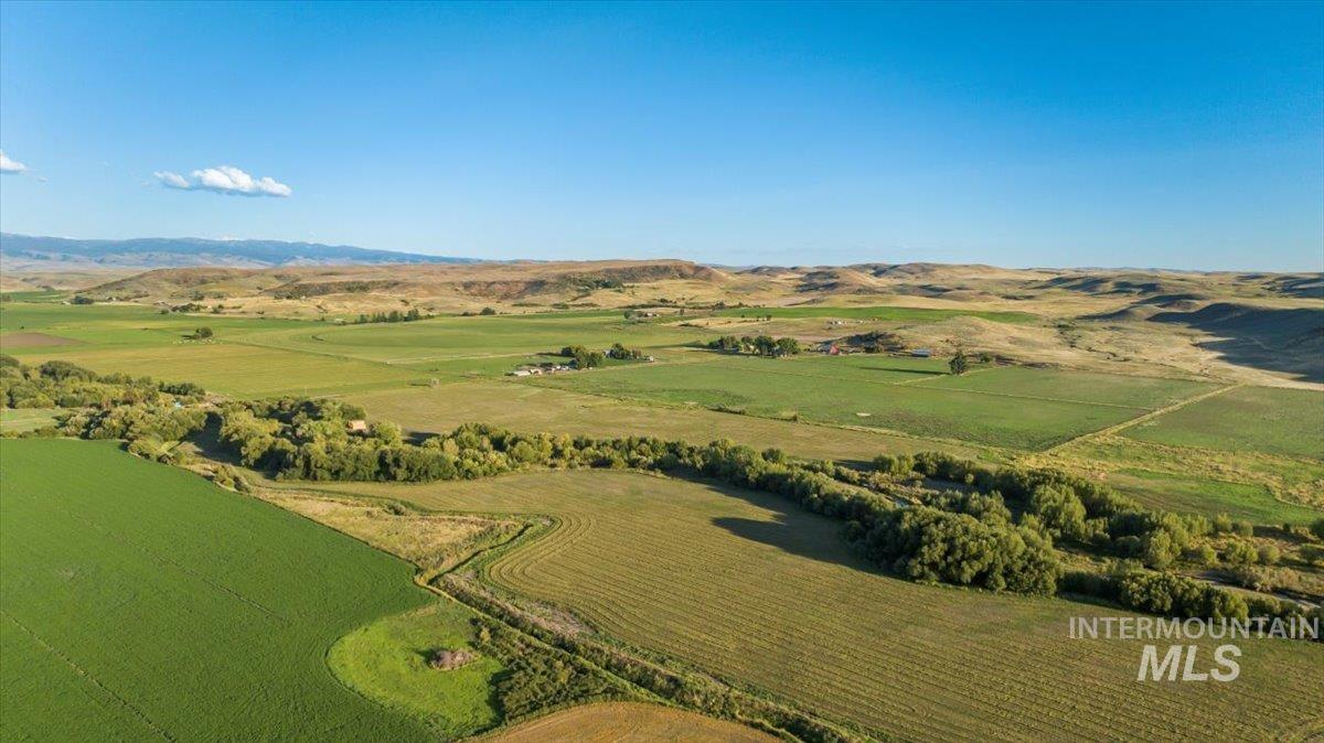 3127 Highway 95 Cambridge, ID 83610 - Photo 14 of 49 Aerial view of property's location featuring rural landscape and a mountain backdrop