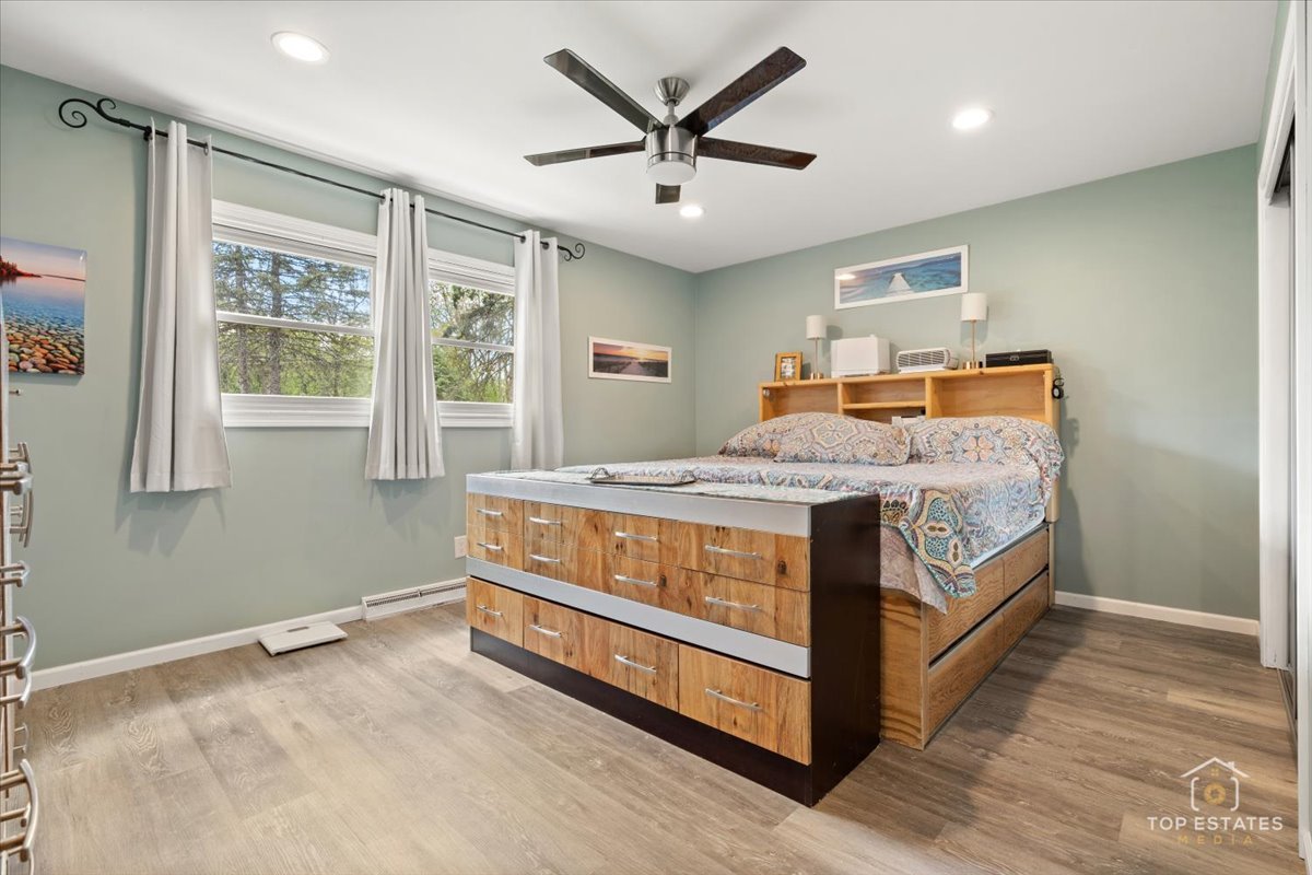 120-3 Three Oaks Road Cary, IL 60013 - Photo 14 of 28 a bedroom with a bed and window