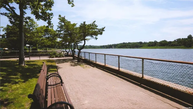 a view of wooden staircase with a lake view
