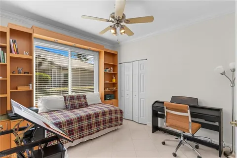 a kitchen with stainless steel appliances granite countertop a refrigerator a sink dishwasher a stove and white countertops with wooden floor