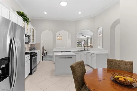 a bathroom with a sink double vanity and a mirror