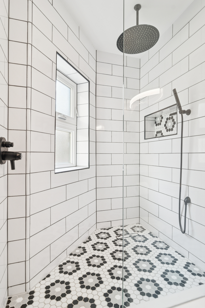 6232 North Broadway, Unit 2 Chicago, IL 60660 - Photo 9 of 23 a bathroom with a shower