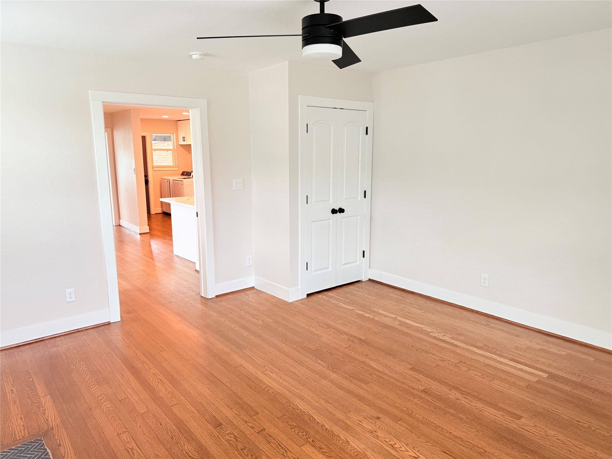 2001 Brun Street, Unit 1 Houston, TX 77019 - Photo 11 of 15 a view of empty room with wooden floor