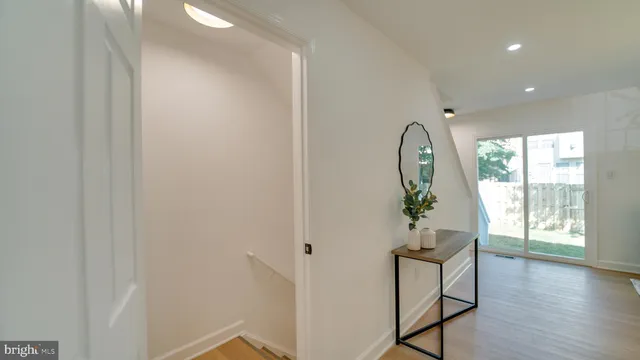 a view of entryway with wooden floor