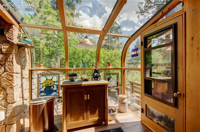 9615 Mountain Road Cascade, CO 80809 - Photo 10 of 31 Almost has a tree house feel