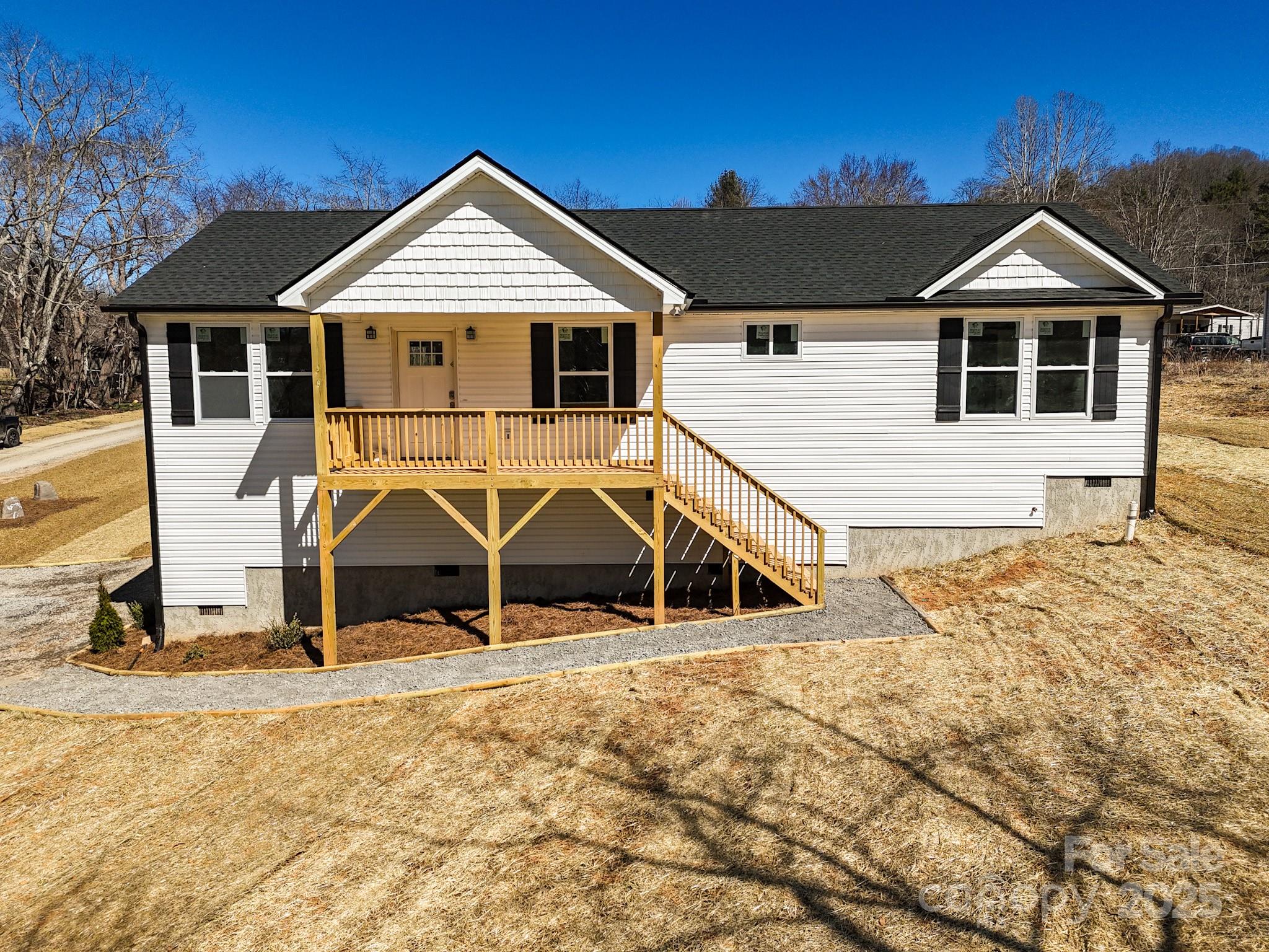731 Abel Road Canton, NC 28716 - Photo 2 of 46 a view of a house with wooden fence